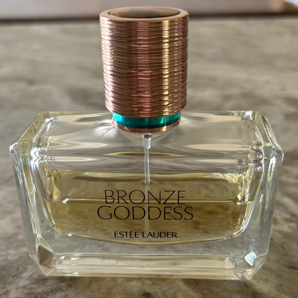 Estee Lauder Bronze Goddess Perfume with Gold and Turquoise Accents